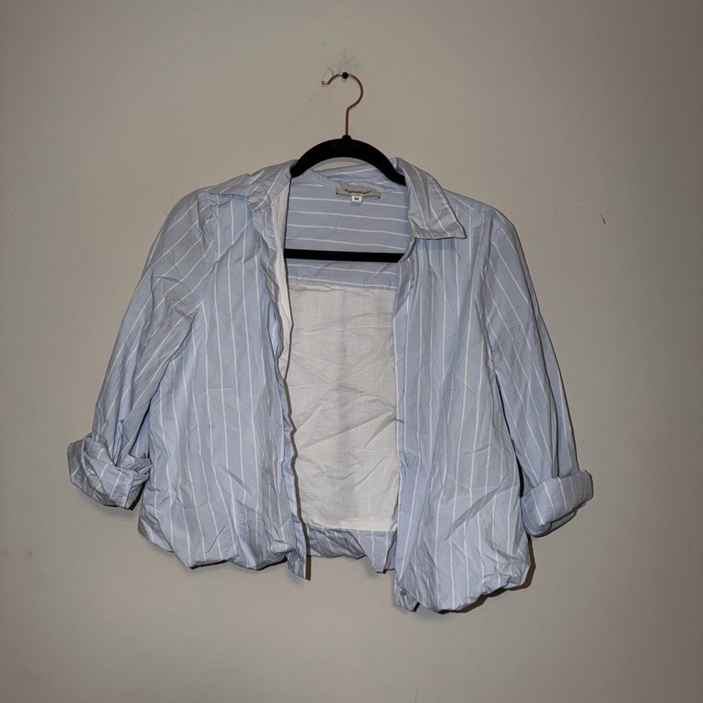 Francesca’s striped blue top